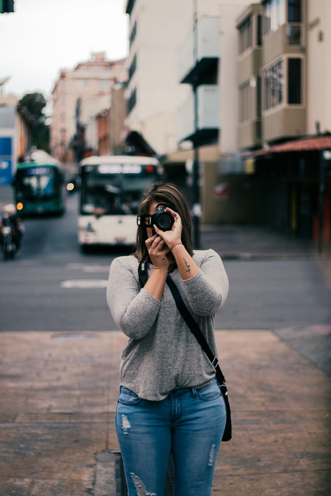 Studio portrait of a young Chilean female street photographer