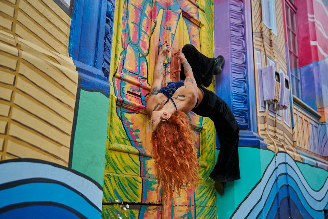 Vibrant street art mural covering a building wall in a Chilean city