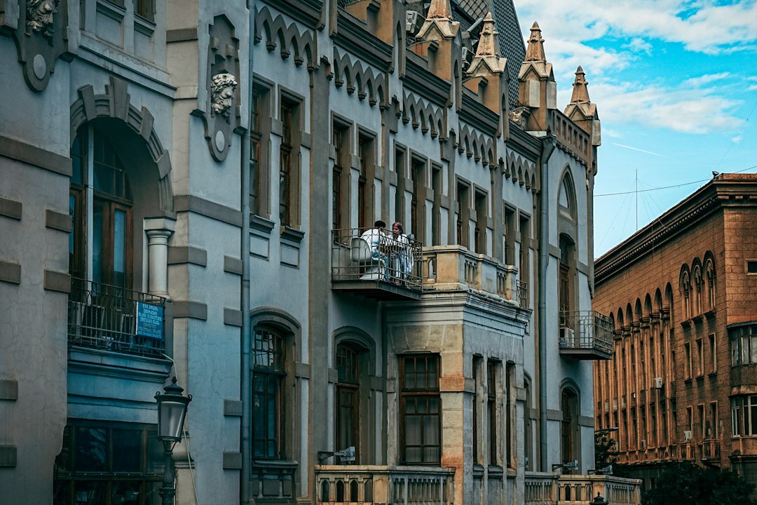 Chilean photographer taking pictures of a historic building facade