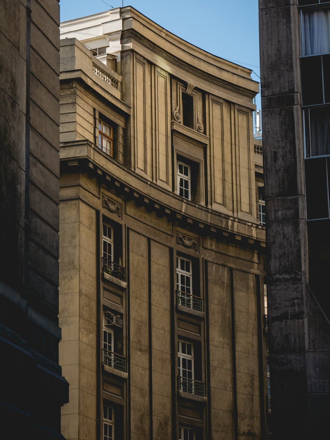 Old balconies and facades of historic apartment buildings in Chile