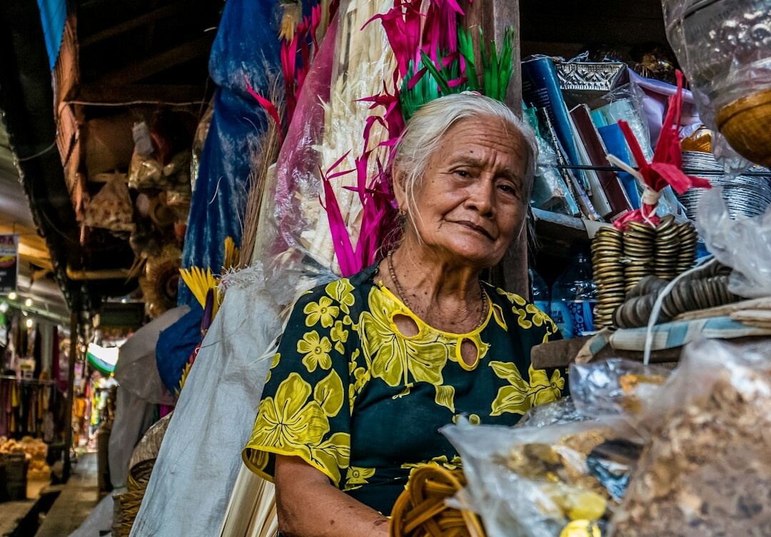 Studio portrait of an elderly Chilean woman market vendor