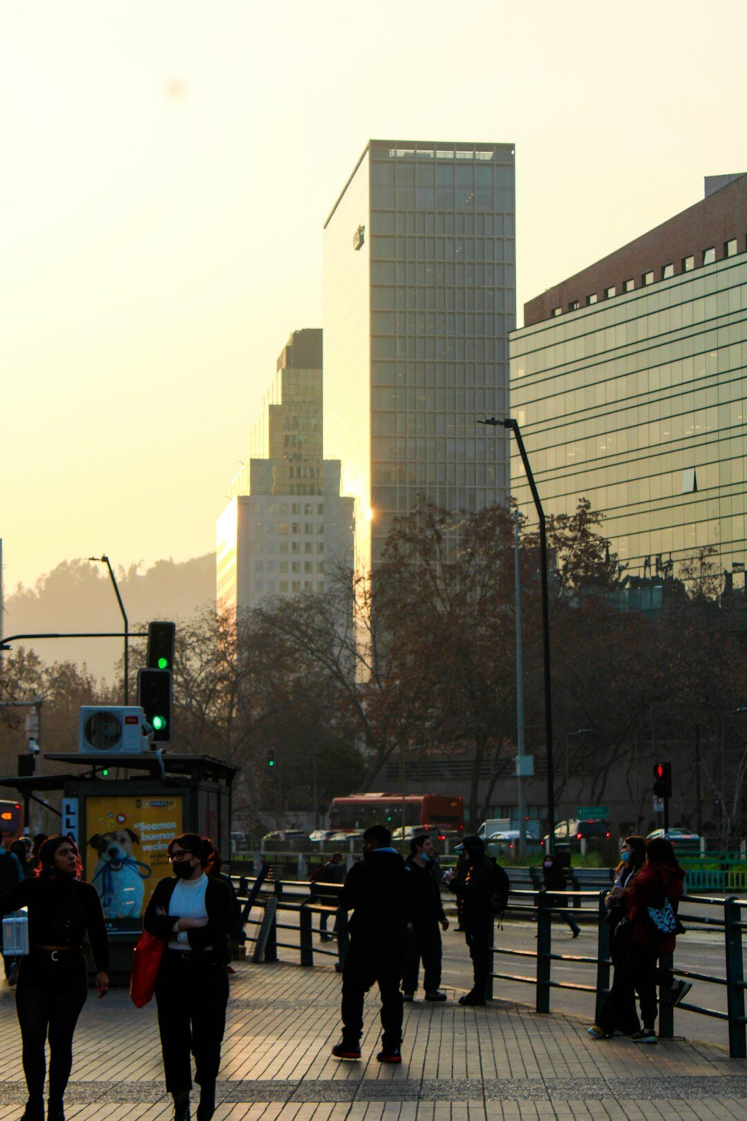 Central plaza with pedestrians walking in a Chilean city